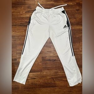 White and black Adidas pants.